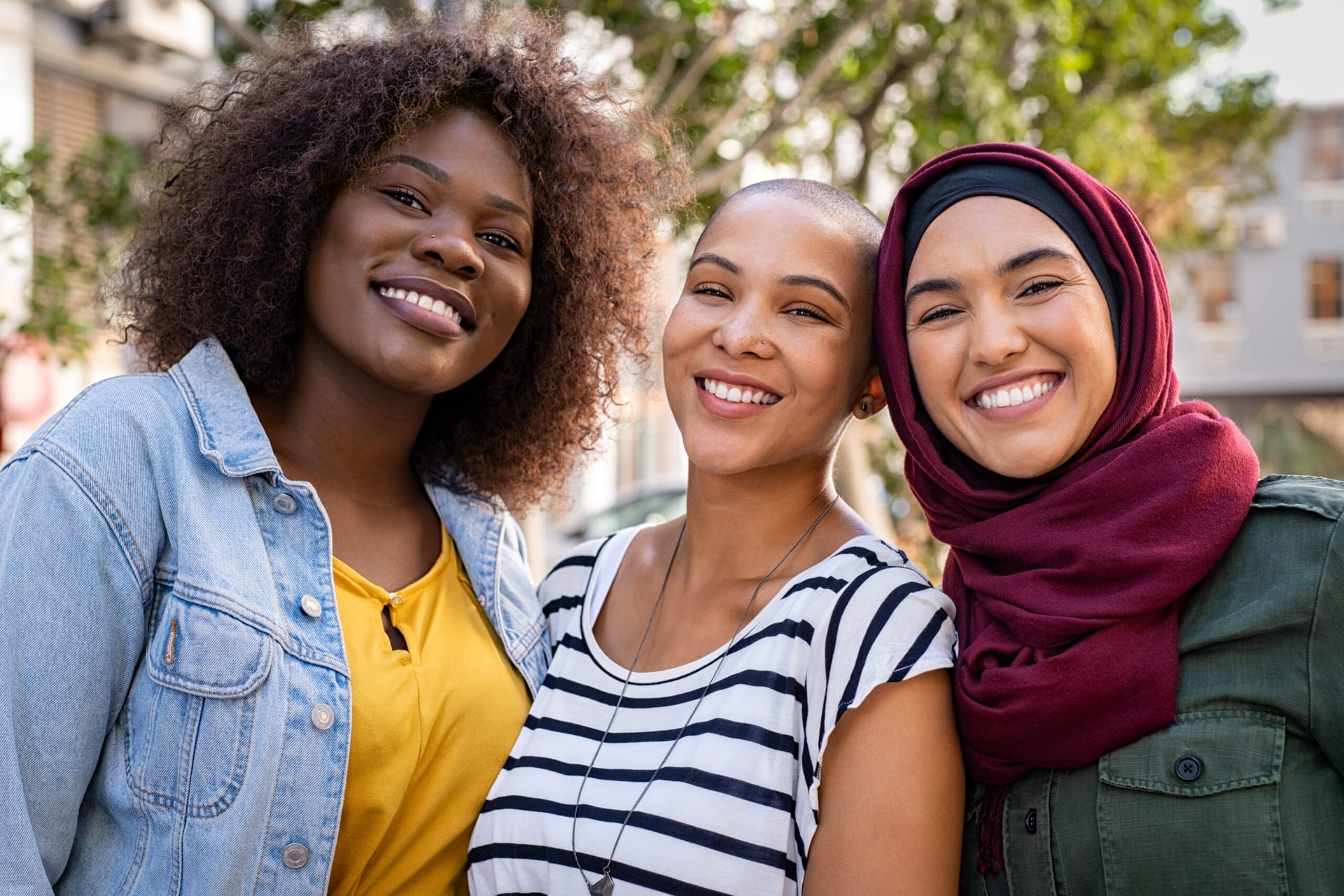 Multiracial group of friends smiling
