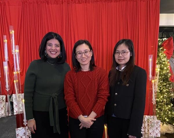 Jenny Huang and Lily Tse, from CASL's legal services department, are recognized by the City of Chicago